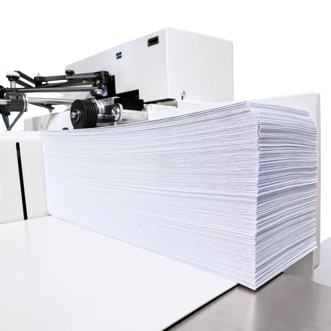 Uniprod handwriting machine outputting a stack of handwritten envelopes